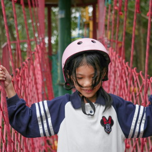 image of girl playing in the play park